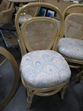 Load image into Gallery viewer, Vintage Washed Rattan Dining Table with Glass Top and Four Upholstered Dining Chairs Cane Backs