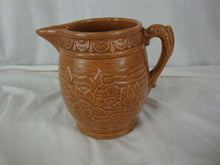 Load image into Gallery viewer, Early Unmarked McCoy Orange Stoneware Water Lily Pitcher with Fish Handle