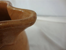 Load image into Gallery viewer, Early Unmarked McCoy Orange Stoneware Water Lily Pitcher with Fish Handle
