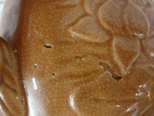 Load image into Gallery viewer, Early Unmarked McCoy Orange Stoneware Water Lily Pitcher with Fish Handle