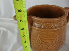 Load image into Gallery viewer, Early Unmarked McCoy Orange Stoneware Water Lily Pitcher with Fish Handle