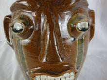Load image into Gallery viewer, Randy Tobias Folk Art Pottery Brown with Green Crying Eyes Ugly Face Jug