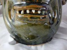 Load image into Gallery viewer, Marvin Bailey Folk Art Pottery Olive Green with Brown Beady Eyed Ugly Face Jug