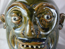 Load image into Gallery viewer, Marvin Bailey Folk Art Pottery Olive Green with Brown Beady Eyed Ugly Face Jug