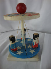 Load image into Gallery viewer, 1970's ? Painted Wood Red/White/Blue Stars Spinning Maypole Toy