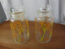 Load image into Gallery viewer, Vintage Anchor Hocking Clear Glass Yellow Green Tree Motif Canisters with Lids