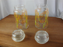 Load image into Gallery viewer, Vintage Anchor Hocking Clear Glass Yellow Green Tree Motif Canisters with Lids