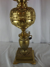 Load image into Gallery viewer, Antique Brass Electrified Oil Lamp Base with Fenton Cranberry Daisy Fern Glass Top Globe