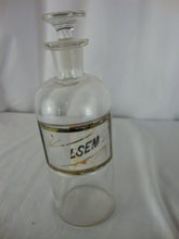 Load image into Gallery viewer, Antique Apothecary Partial Label (LSEM) Small Bottle with Glass Stopper