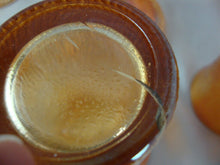 Load image into Gallery viewer, Vintage Jeanette Glass Marigold Carnival Treebark Beverage Pitcher with Lid and Eight Glasses Set