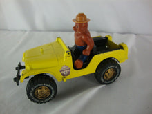 Load image into Gallery viewer, Vintage Hubley Smokey the Bear Jeep with Smokey Figurine