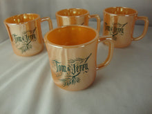 Load image into Gallery viewer, 1950s Fire King Peach Luster Tom & Jerry Holiday Mugs Set of 4