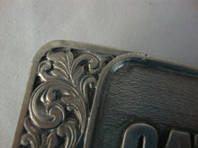 Load image into Gallery viewer, Vintage CAT Truck Engines USA Made Scrollwork Belt Buckle