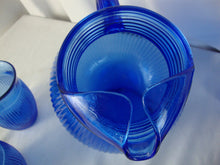 Load image into Gallery viewer, 1930s Hazel Atlas Cobalt Blue Fine Ribbed Ball Pitcher and Four Tumbler Glasses