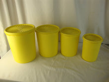 Load image into Gallery viewer, Vintage Tupperware Lemon Yellow Nesting Canister Set 4 Piece