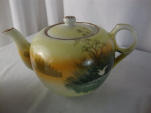 Load image into Gallery viewer, Vintage Japan Handpainted Teapot Creamer Sugar Set Bird over Marsh Motif