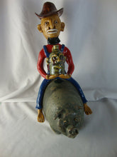 Load image into Gallery viewer, Marvin Bailey Artist Signed Cowboy Farmer with Mini Ugly Face Jug on Green Specked Pig Stack