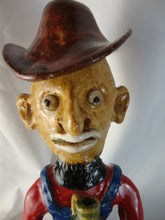 Load image into Gallery viewer, Marvin Bailey Artist Signed Cowboy Farmer with Mini Ugly Face Jug on Green Specked Pig Stack