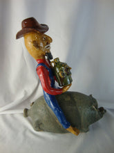Load image into Gallery viewer, Marvin Bailey Artist Signed Cowboy Farmer with Mini Ugly Face Jug on Green Specked Pig Stack