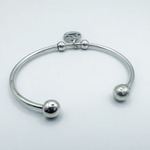 Load image into Gallery viewer, Vintage Sterling Silver Paw Print Charm Open Bangle Bracelet