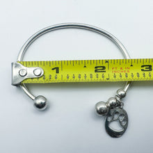 Load image into Gallery viewer, Vintage Sterling Silver Paw Print Charm Open Bangle Bracelet