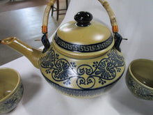 Load image into Gallery viewer, Vintage Porcelain Tan/Blue Floral Teapot with Bamboo Handle and (6) No Handle Tea Cups