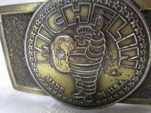 Load image into Gallery viewer, Vintage Michelin Made In USA Tire Man Brass Belt Buckle
