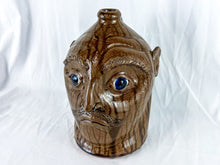Load image into Gallery viewer, Large Mike Craven Signed Brown Ugly Face Jug with Big Round Blue Eyes
