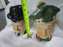 Load image into Gallery viewer, 1976 Ezra Brooks Laurel &amp; Hardy Empty Figural Whiskey Decanters Pair
