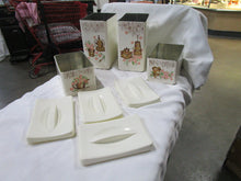 Load image into Gallery viewer, Vintage Ransberg Tin Country Floral Kitchen Canister Set of 4 with Matching Lids
