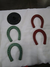 Load image into Gallery viewer, 1950's Auburn Toys Children's Rubber Horseshoes and (1) Black Rubber Throw Base
