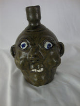 Load image into Gallery viewer, Harold &amp; Grace Hewell 1999 Signed Folk Art Moss Green Ugly Face Jug
