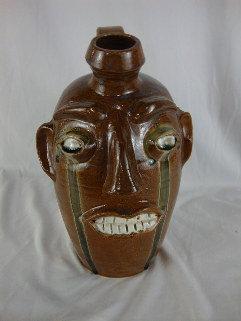 Randy Tobias Folk Art Pottery Brown with Green Crying Eyes Ugly Face Jug