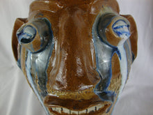 Load image into Gallery viewer, Randy Tobias Folk Art Pottery Brown Bearded with Blue/White Crying Eyes Ugly Face Jug
