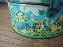 Load image into Gallery viewer, Vintage TinDeco Peter Rabbit on Parade Hinged Oval Trinket Box
