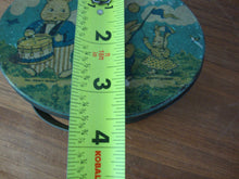 Load image into Gallery viewer, Vintage TinDeco Peter Rabbit on Parade Hinged Oval Trinket Box
