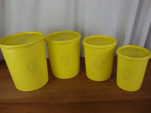 Load image into Gallery viewer, Vintage Tupperware Lemon Yellow Plastic Nesting Kitchen Canister Set of 4 with Lids
