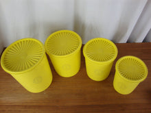 Load image into Gallery viewer, Vintage Tupperware Lemon Yellow Plastic Nesting Kitchen Canister Set of 4 with Lids
