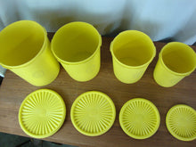 Load image into Gallery viewer, Vintage Tupperware Lemon Yellow Plastic Nesting Kitchen Canister Set of 4 with Lids
