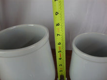 Load image into Gallery viewer, Vintage McCoy Stoneware White Canisters with Green Lids Set of 2
