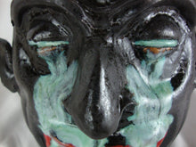 Load image into Gallery viewer, Marvin Bailey Pottery Dark Body with Aqua Crying Eyes Red Clown Lips Wonky Teeth Ugly Face Jug
