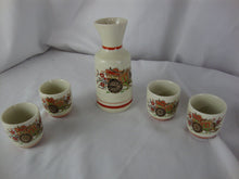Load image into Gallery viewer, Vintage Japan Ceramic Floral Cart Sake Set with Four Cups and Decanter
