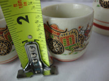 Load image into Gallery viewer, Vintage Japan Ceramic Floral Cart Sake Set with Four Cups and Decanter
