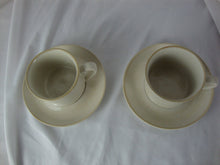 Load image into Gallery viewer, Vintage Japan Stoneware Cream and Tan Cup and Saucer Set of 2
