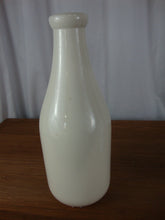 Load image into Gallery viewer, Vintage Ile d&#39;Orlians Quebec Ceramic Cow with Bell Milk Bottle
