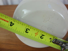 Load image into Gallery viewer, Vintage Ile d&#39;Orlians Quebec Ceramic Cow with Bell Milk Bottle
