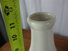 Load image into Gallery viewer, Vintage Ile d&#39;Orlians Quebec Ceramic Cow with Bell Milk Bottle
