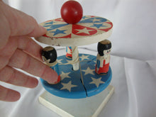Load image into Gallery viewer, 1970&#39;s ? Painted Wood Red/White/Blue Stars Spinning Maypole Toy
