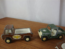 Load image into Gallery viewer, Vintage TootsieToy Military Jeeps/Trucks (3) and (3) Military Trailers Lot of 6

