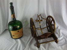 Load image into Gallery viewer, Vintage Courvoisier Cognac Empty Gallon Bottle on Canon Pour Stand
